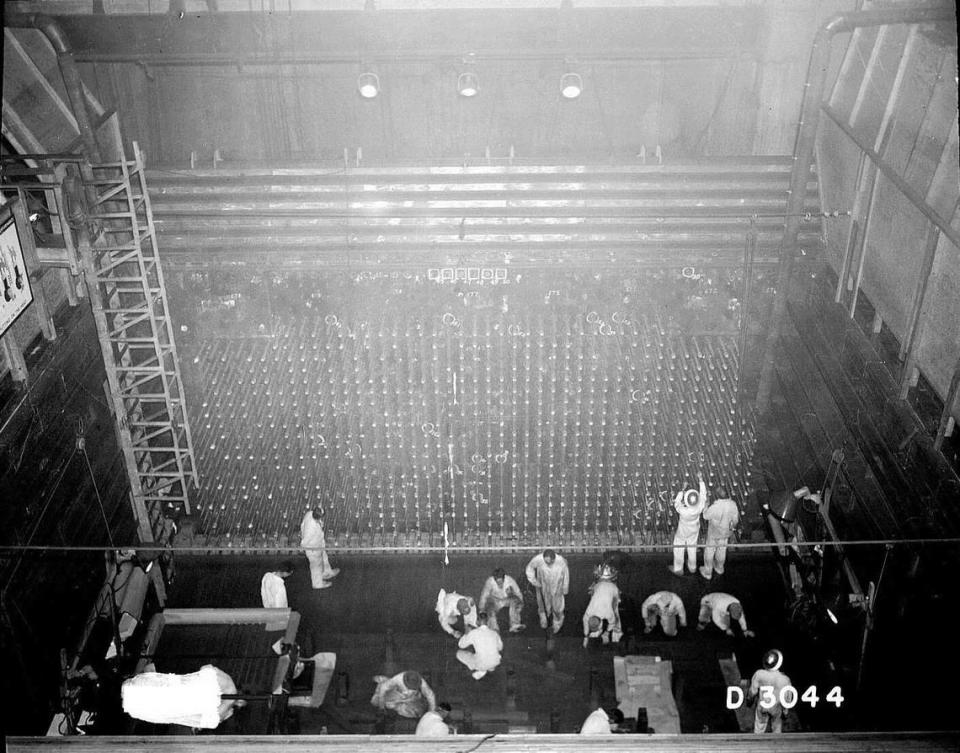 This historic photo shows work being done on the front face of Hanford’s B Reactor, the world’s first production-scale nuclear reactor. Photo courtesy DOE