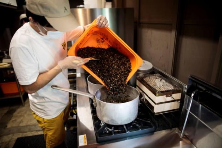 Japanese chef Yuto Shinohara has high hopes for a range of additional insect-based products, including beer made from crickets and a tea made from silkworm excrement (AFP Photo/Behrouz MEHRI)
