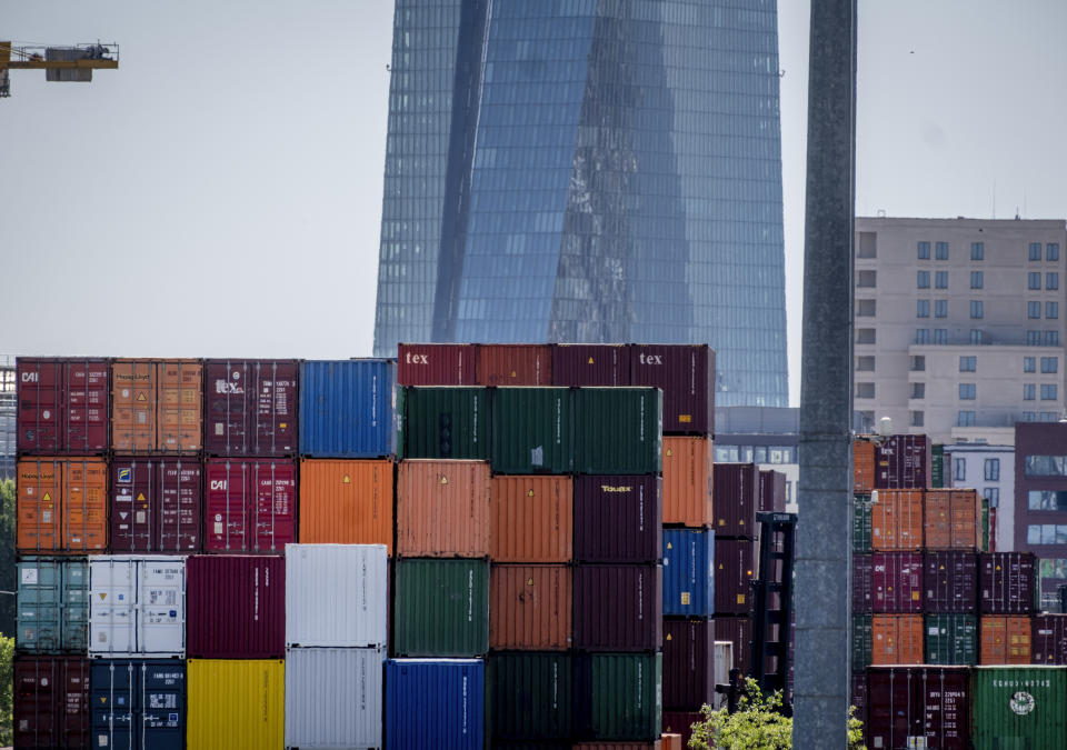 Containers are piled up at the cargo container terminal in Frankfurt, Germany, Wednesday, May 31, 2023. In background is the European Central Bank. German inflation eased to 6.1% in May following several months of declines, even as Europe’s biggest economy registered another painful increase in food prices of nearly 15%. (AP Photo/Michael Probst)