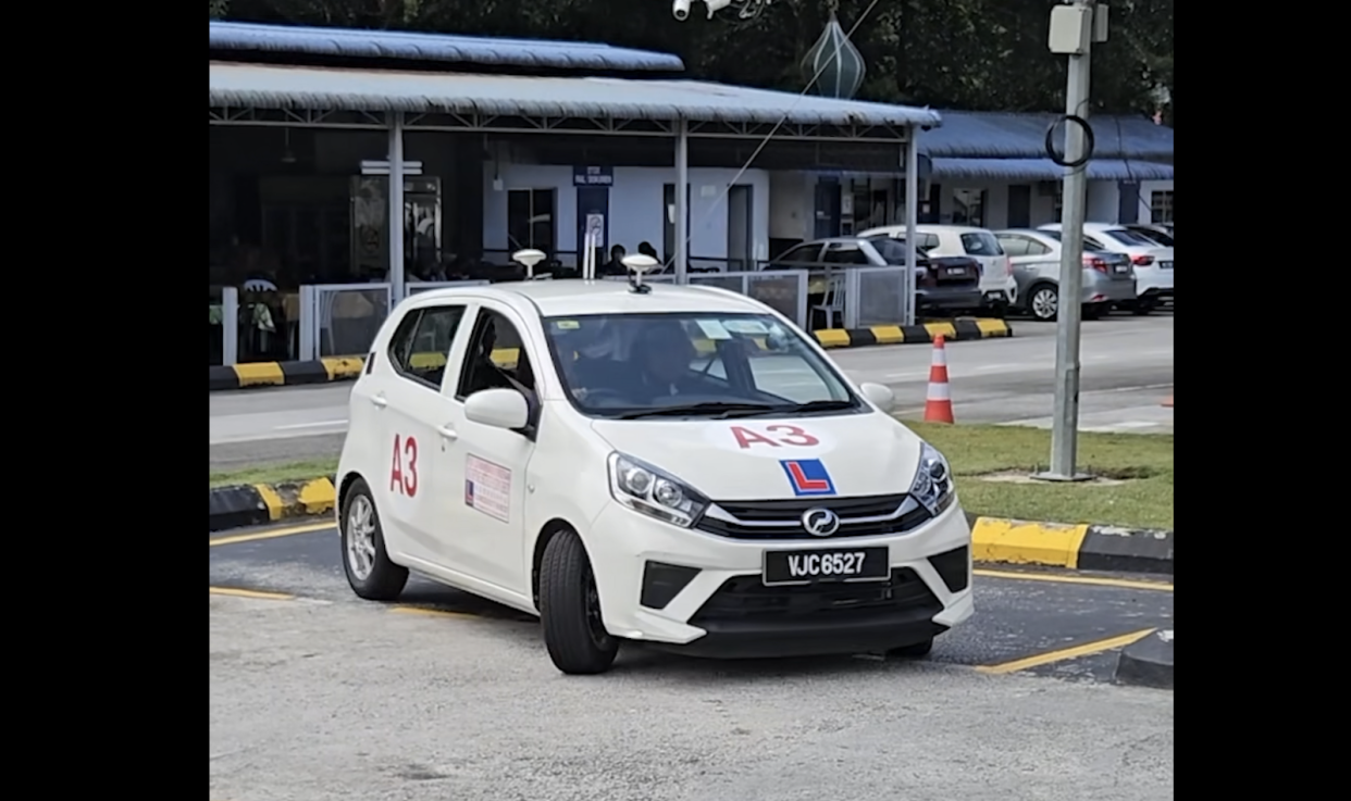 A learners car in Malaysia equipped with e-Testing scanners and cameras