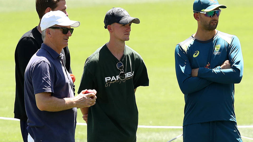 Steve Waugh and his son Austin speak with Nathan Lyon. (Photo by Ryan Pierse/Getty Images)