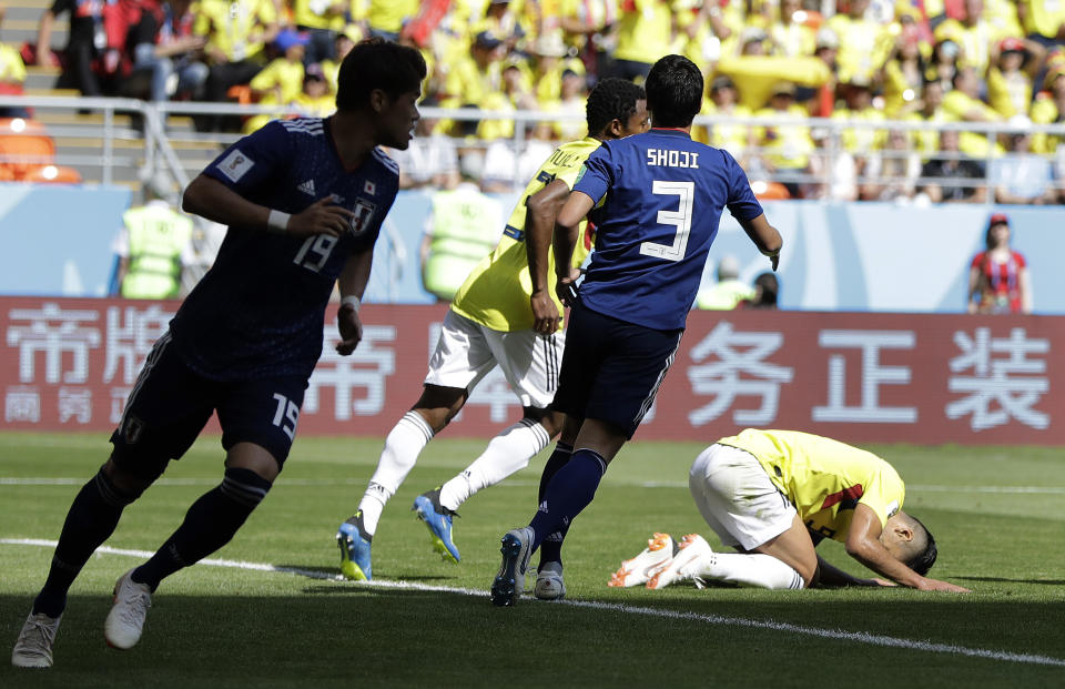 <p>Colombia’s Radamel Falcao can’t believe he has missed as Colombia search for an equaliser </p>