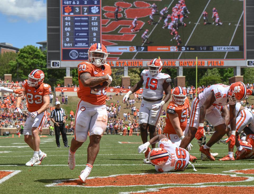 Clemson running back Domonique Thomas (20) scores a touchdown during the first quarter the annual Orange and White Spring game at Memorial Stadium in Clemson, S.C. Saturday, April 15, 2023. 