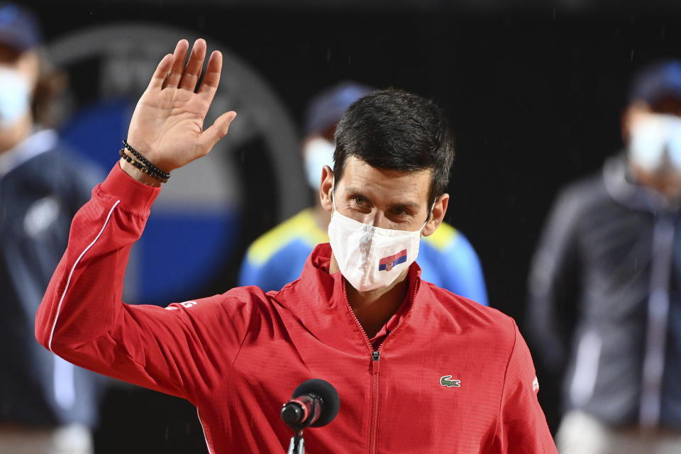 Serbia's Novak Đjoković celebrates winning his match with Argentina's Diego Sebastián Schwartzman during their final match at the Italian Open tennis tournament, in Rome, Monday, Sept. 21, 2020. (Alfredo Falcone/LaPresse via AP)