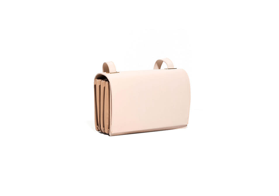 <p>& Other Stories Pleated Shoulder Bag, $195, <a href="http://www.stories.com/us/Bags/All_bags/Metallic_Backpack/590765-101181362.1" rel="nofollow noopener" target="_blank" data-ylk="slk:stories.com;elm:context_link;itc:0;sec:content-canvas" class="link ">stories.com</a></p>