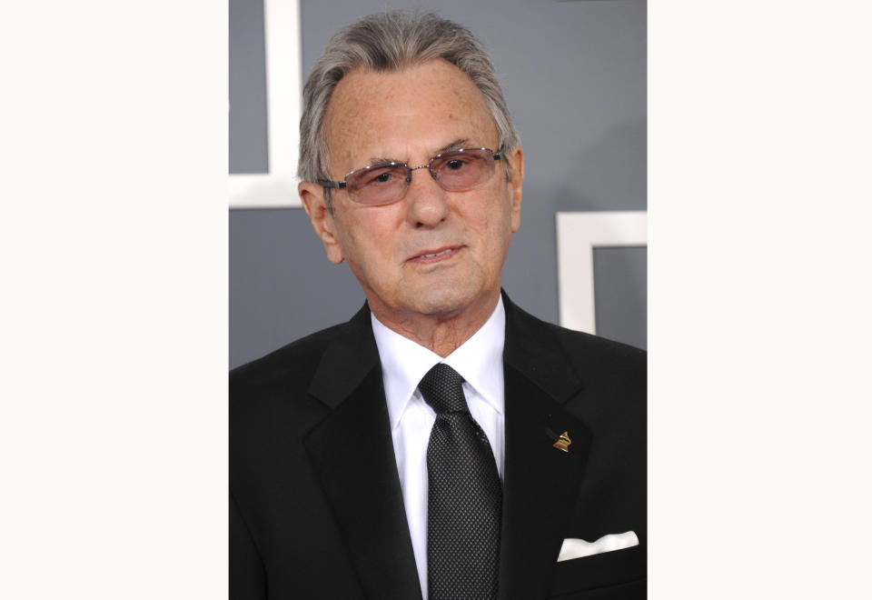 FILE - Recording engineer Al Schmitt arrives at the 55th annual Grammy Awards on Feb. 10, 2013, in Los Angeles. Schmitt, one of the world's most honored musical producers and engineers has died. The Grammy winner, who worked with everyone from Sam Cooke to Steely Dan to Frank Sinatra, was 91. (Photo by Jordan Strauss/Invision/AP, File)