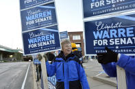 Supporters of Democratic U.S. Sen. Elizabeth Warren gather for the Massachusetts U.S. Senatorial debate against Republican challenger state Rep. Geoff Diehl, Sunday, Oct. 21, 2018, in Springfield, Mass. (Frederick Gore/The Republican via AP)