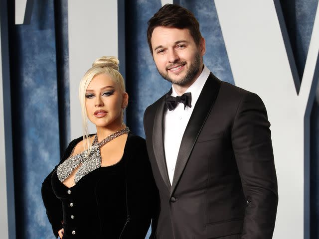 <p>Daniele Venturelli/Getty</p> Christina Aguilera and Matthew Rutler at the 2023 Vanity Fair Oscar Party.