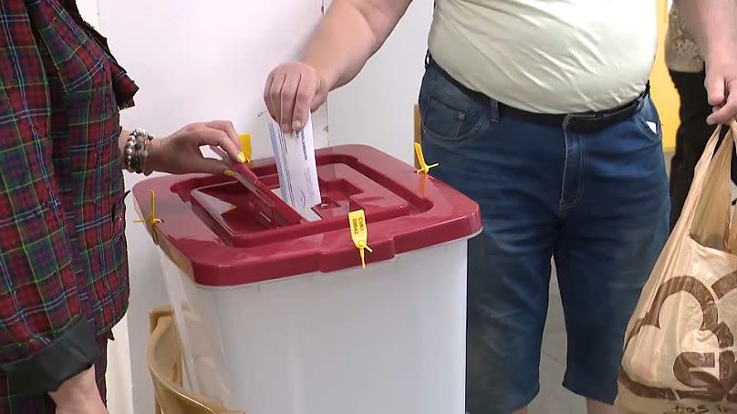 Voting at a polling station in Riga, June 8, 2024