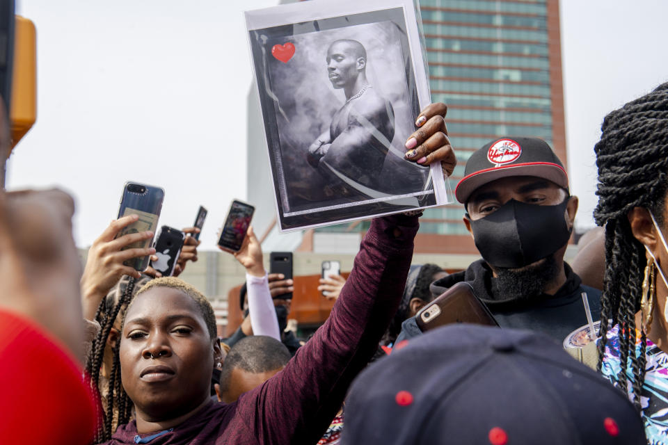 People gather for a "Celebration of Life Memorial" for rapper DMX at Barclays Center, Saturday, April. 24, 2021, in the Brooklyn borough of New York. DMX, whose birth name is Earl Simmons, died April 9 after suffering a "catastrophic cardiac arrest." (AP Photo/Brittainy Newman)