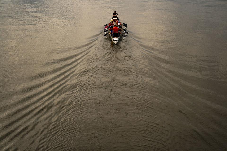 The DC Dragon Boat Club practices in the Washington Channel.