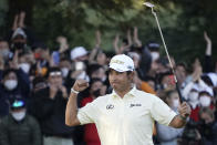 Hideki Matsuyama of Japan gestures after winning the final round of the Zozo Championship golf tournament at Accordia Golf Narashino Country Club on Sunday, Oct. 24, 2021 in Inzai, Chiba Prefecture, Japan. (AP Photo/Tomohiro Ohsumi)