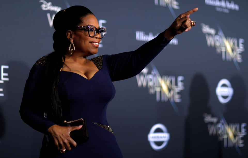 Cast member Oprah Winfrey poses at the premiere of 