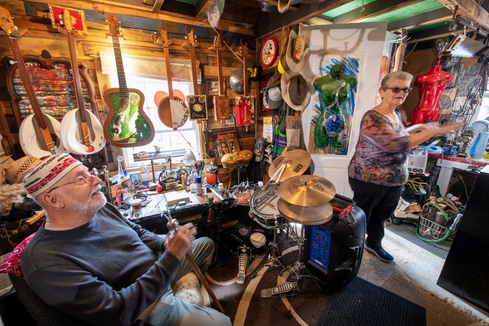 Parker James Hooker, left, and Robin Robinson inside the "he shed" that was supposed to be a "she shed."