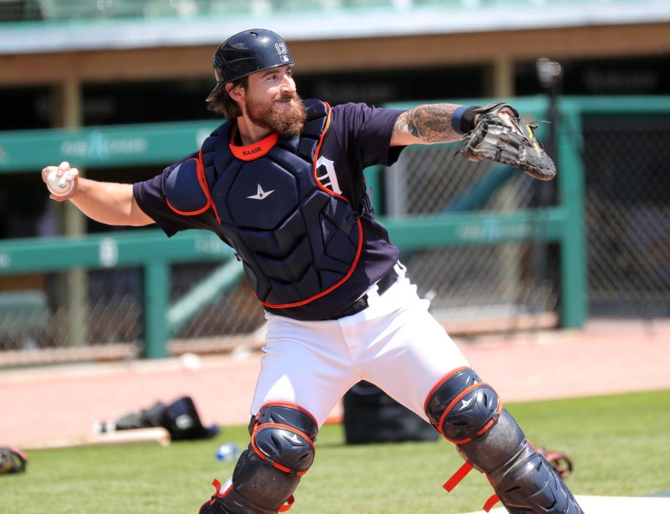 Detroit Tigers catcher Eric Haase throws to second during practice at Comerica Park, Monday, July 6, 2020.