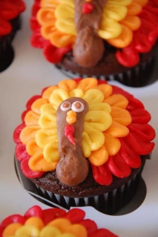 <p>Always the Holidays</p><p> Use colorful frosting and special icing tips to make these adorable turkey cupcakes for Thanksgiving.</p><p><strong>Get the recipe:</strong> <a href="https://alwaystheholidays.com/cute-turkey-cupcakes/" rel="nofollow noopener" target="_blank" data-ylk="slk:Cute Turkey Cupcakes;elm:context_link;itc:0;sec:content-canvas" class="link rapid-noclick-resp"><strong>Cute Turkey Cupcakes</strong></a></p>