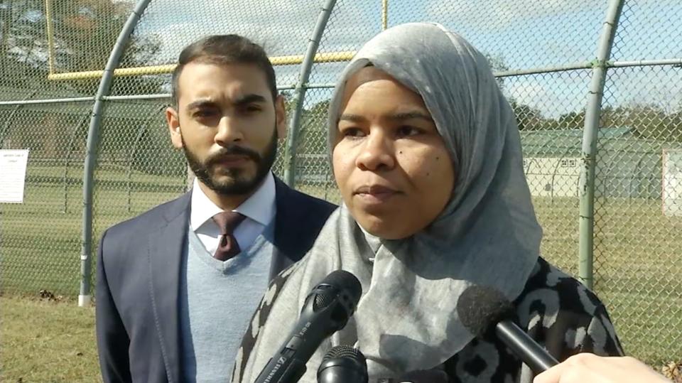 Madinah Brown, a Rehabilitation Counselor at the New Castle County Detention Center speaks to the media about being denied the ability to work while wearing a hijab since July of this year Thursday afternoon. 