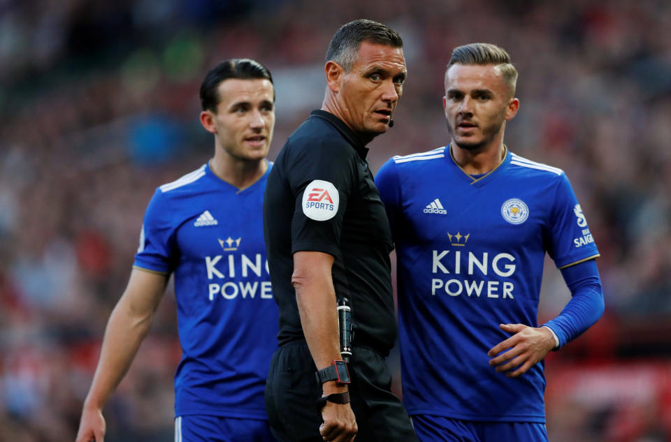 <p>Soccer Football – Premier League – Manchester United v Leicester City – Old Trafford, Manchester, Britain – August 10, 2018 Referee Andre Marriner and Leicester City’s James Maddison Action Images via Reuters/Andrew Boyers EDITORIAL USE ONLY. No use with unauthorized audio, video, data, fixture lists, club/league logos or “live” services. Online in-match use limited to 75 images, no video emulation. No use in betting, games or single club/league/player publications. Please contact your account representative for further details. </p>