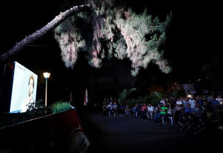 People watch the World Cup 2018 match between Egypt and Russia, in Damascus, Syria June 19, 2018. Picture taken June 19, 2018. REUTERS/Omar Sanadiki