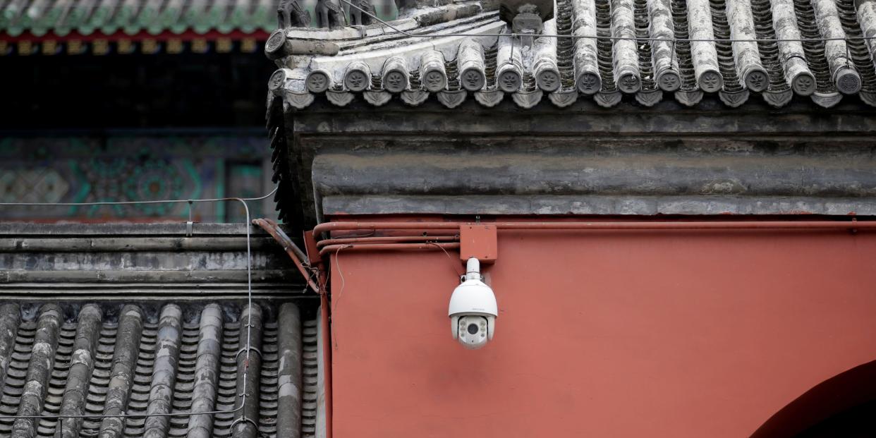 A Hikvision surveillance camera is seen on the Drum Tower in downtown Beijing, China June 19, 2019.