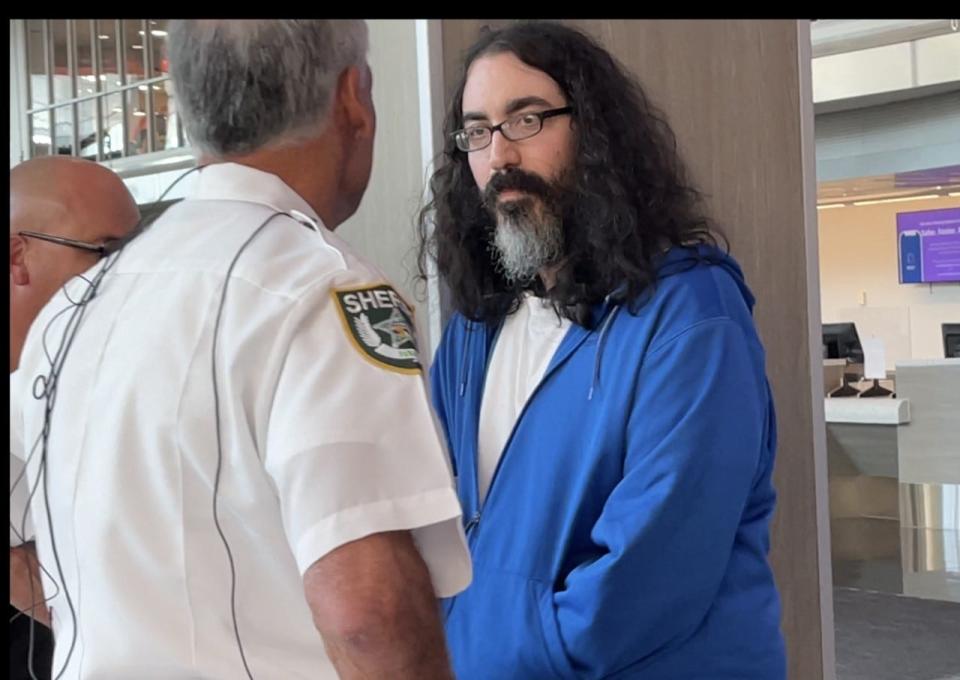 In this March 2023 file photo, Richard Golden, the New Jersey man who told white supremacists in a hate chat group to murder Sheriff Mike Chitwood, meets the sheriff when he arrived in Florida. Golden was extradited to Volusia County and taken to jail.