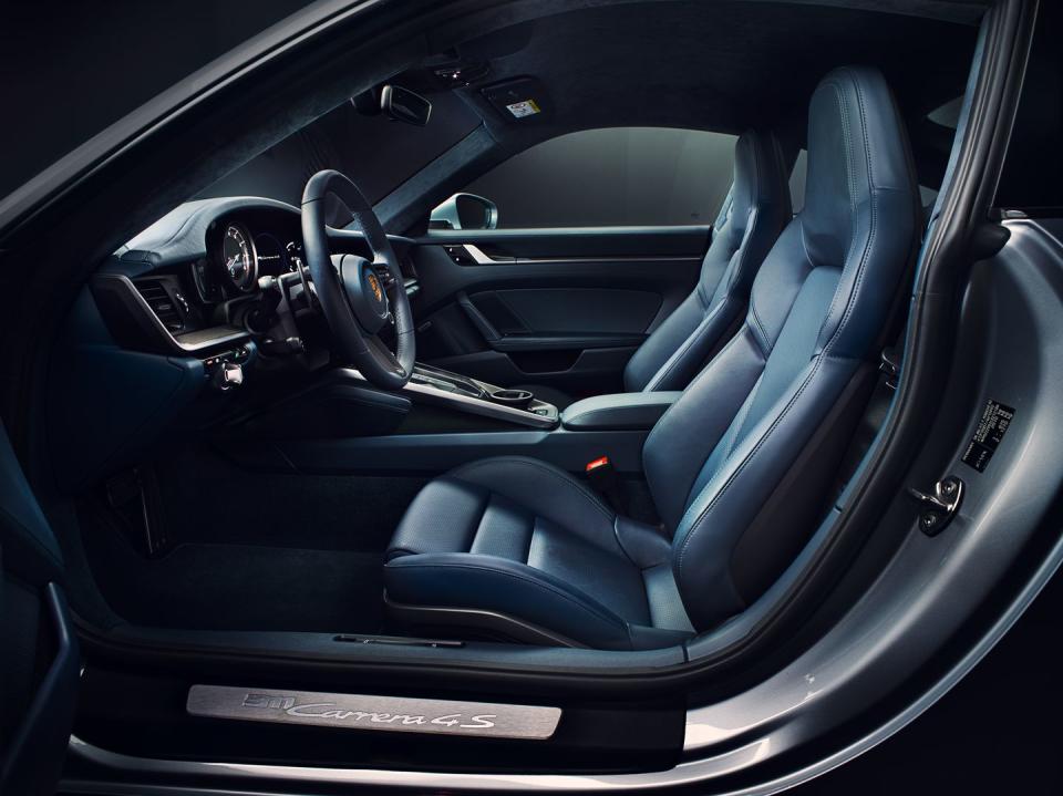 <p>A larger, 10.9-inch touchscreen pulled right from the Panamera and Macan updates the 911's interior.</p>