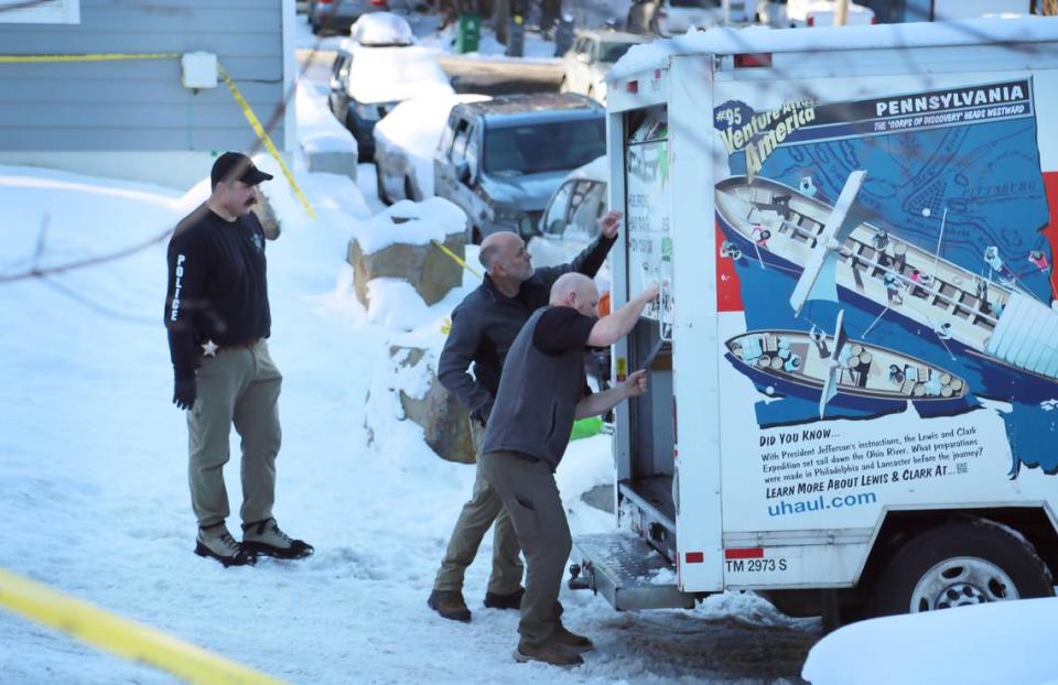 Law enforcement officials on Wednesday pack and remove the personal belongings of the University of Idaho victims from their rental house to return to their families.
