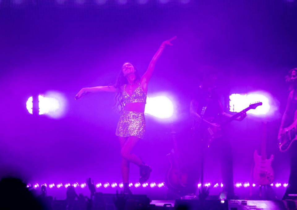 Olivia Rodrigo dances on stage as she performs "bad idea, right?" during the first stop on the "Guts" tour at Acrisure Arena in Palm Desert, Calif., Friday, Feb. 23, 2024.