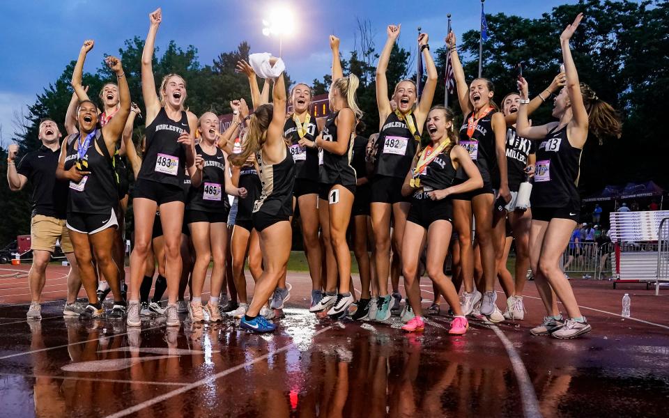 Noblesville athletes yell in excitement Saturday, June 3, 2023, during the IHSAA girls track and field state finals at Robert C. Haugh Track and Field Complex at Indiana University in Bloomington. 