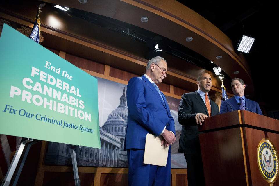 From left, Senate Majority Leader Chuck Schumer, D-N.Y., Sen. Cory Booker, D-N.J., and Sen. Ron Wyden, D-Ore., announce a draft bill that would decriminalize marijuana on a federal level Capitol Hill in Washington, on Wednesday, July 14, 2021. The bill, called the Cannabis Administration and Opportunity Act, would not only decriminalize marijuana, but also expunge the records of those with non-violent convictions related to cannabis and invest money into restorative justice programs. (AP Photo/Amanda Andrade-Rhoades)