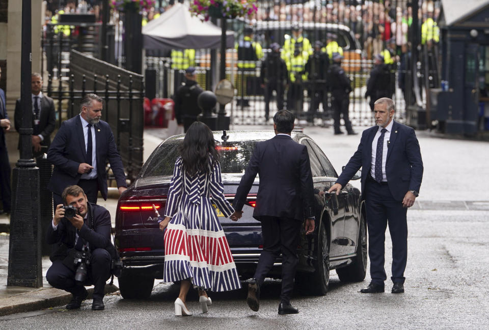 Britain's outgoing Conservative Party Prime Minister Rishi Sunak, and his wife Akshata Murty leave after Sunak made a short speech outside 10 Downing Street before going to see King Charles III to tender his resignation in London, Friday, July 5, 2024. Sunak and his Conservative Party lost the general election held July 4, to the Labour Party, whose leader Keir Starmer is set become Prime Minister later Friday. (Lucy North/PA via AP)