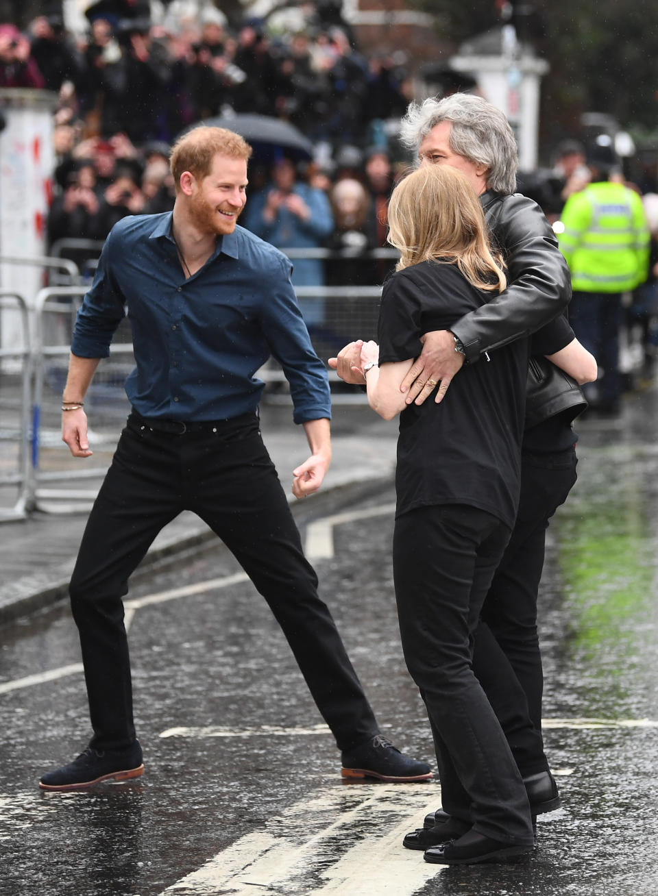 The Duke of Sussex, Jon Bon Jovi and members of the Invictus Games Choir after they walked on the famous zebra crossing outside the Abbey Road Studios in London. PA Photo. Picture date: Friday February 28, 2020. They are recording a special single in aid of the Invictus Games Foundation at the studios. See PA story ROYAL Sussex. Photo credit should read: Victoria Jones/PA Wire