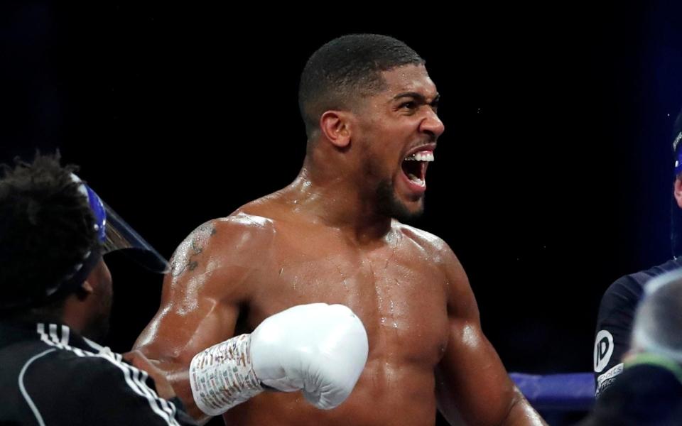 Boxing - Heavyweight World Title Fight - Anthony Joshua v Kubrat Pulev - The SSE Arena, London, Britain - December 12, 2020 Anthony Joshua celebrates winning his fight against Kubrat Pulev Pool - Reuters