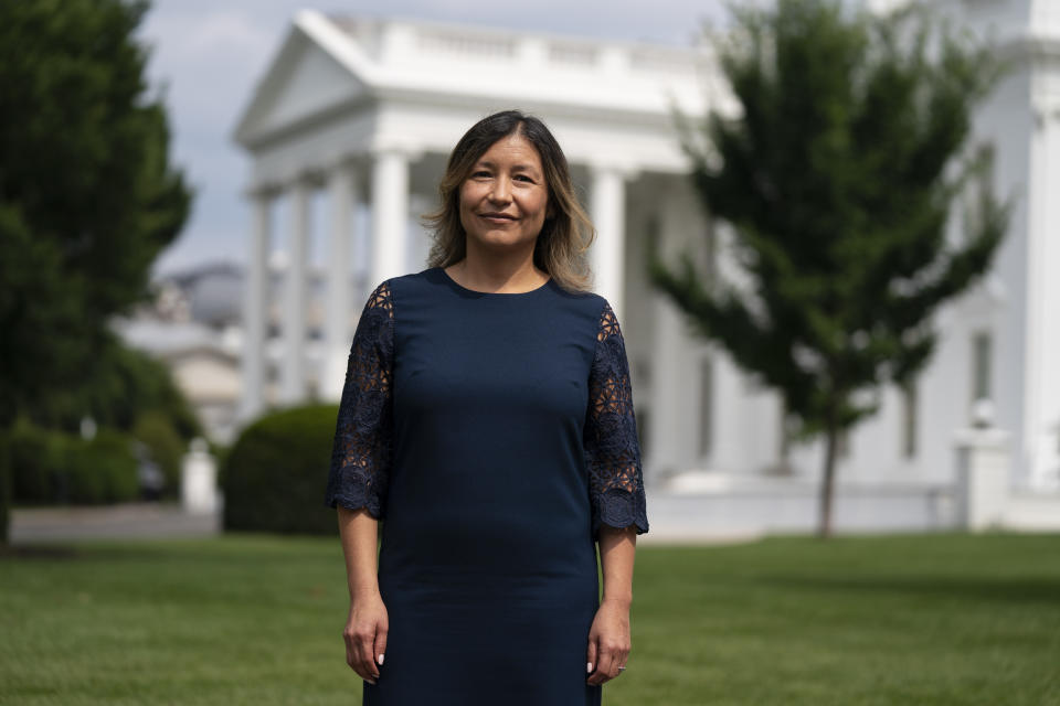 FILE - White House Intergovernmental Affairs director Julie Chavez Rodriguez stands outside the White House, June 9, 2021, in Washington. (AP Photo/Evan Vucci, File)