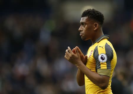 Britain Football Soccer - West Bromwich Albion v Arsenal - Premier League - The Hawthorns - 18/3/17 Arsenal's Alex Iwobi applauds fans after the match Action Images via Reuters / Andrew Boyers Livepic