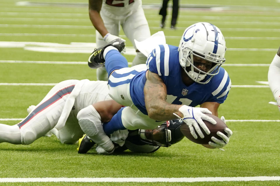 Indianapolis Colts wide receiver Michael Pittman Jr. (11) dives to the end zone during the second half of an NFL football game Sunday, Sept. 11, 2022, in Houston. (AP Photo/Eric Christian Smith)