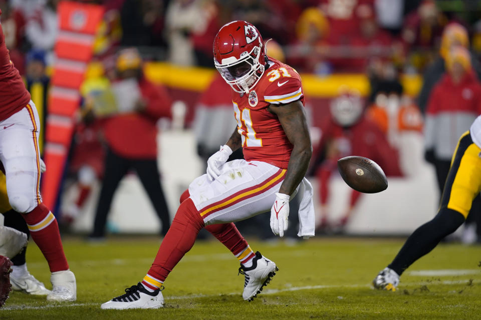 Kansas City Chiefs running back Darrel Williams (31) fumbles the ball during the first half of an NFL wild-card playoff football game against the Pittsburgh Steelers, Sunday, Jan. 16, 2022, in Kansas City, Mo. (AP Photo/Ed Zurga)