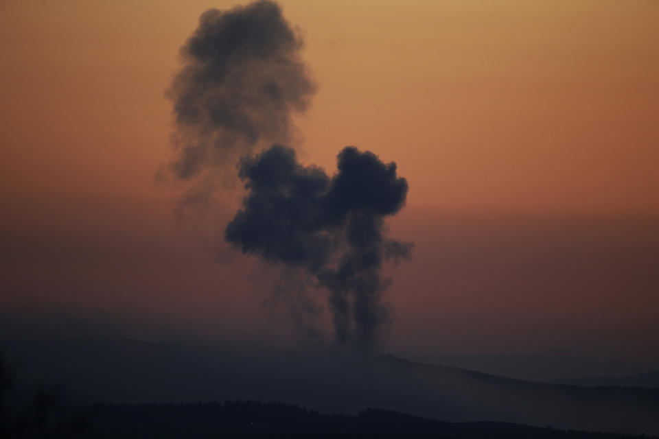 <p>Plumes of smoke rise on the air from inside Syria, as seen from the outskirts of the border town of Kilis, Turkey on Jan. 20, 2018. (Photo: Lefteris Pitarakis/AP) </p>