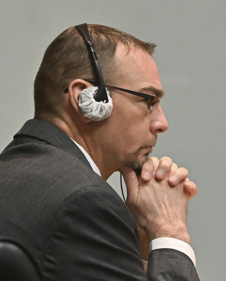 James Crumbley listens during his trial in the Oakland County Courtroom on Monday, March 11, 2024, in Pontiac, Mich. Crumbley is on trial for involuntary manslaughter in his 15-year-old son's killing of four students at Oxford High School. (Daniel Mears/Detroit News via AP, Pool)