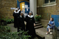 <p>Benedictine nuns from Tyburn Convent leave after voting in Britain’s general election at a polling station in St John’s Parish Hall, London, Thursday, June 8, 2017. (Photo: Matt Dunham/AP) </p>