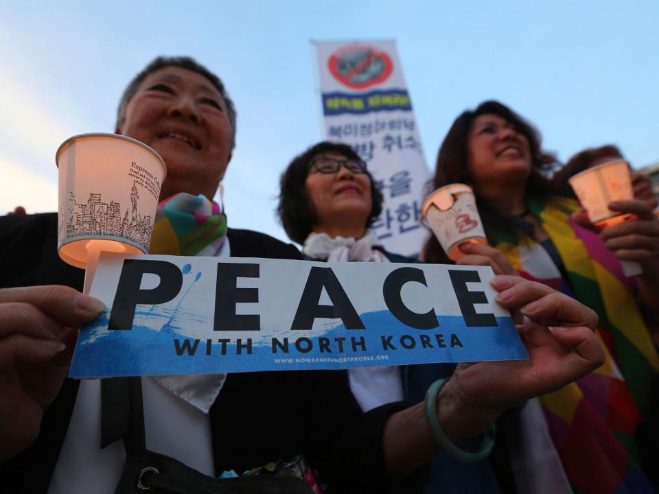 Protesters denounce the latest US move near the US embassy in Seoul on Friday: AP