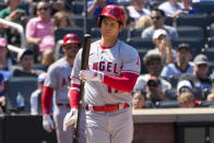 Los Angeles Angels designated hitter Shohei Ohtani inspects his bat after striking during the eighth inning of a baseball game against the New York Mets, Sunday, Aug. 27, 2023, in New York. (AP Photo/Mary Altaffer)