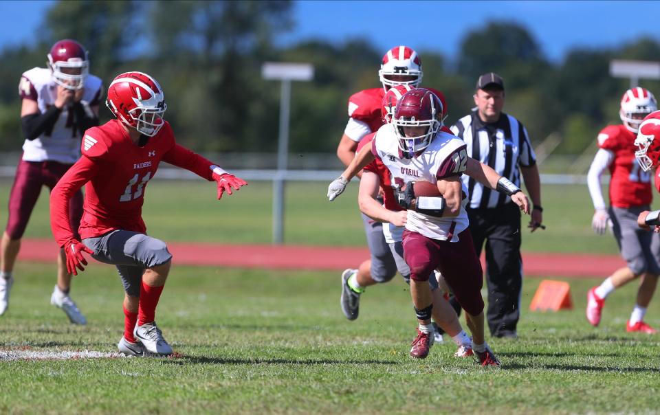 O'Neill's Jadon Spain (12) with the carry during their 35-7 win over Red Hook in football action at Red Hook High School in Red Hook on Saturday, September 24, 2022.