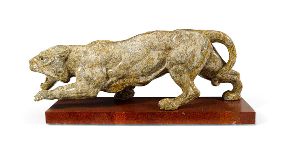 A Roman Grand Tour-type carved marble model of a panther. - Credit: Bonhams