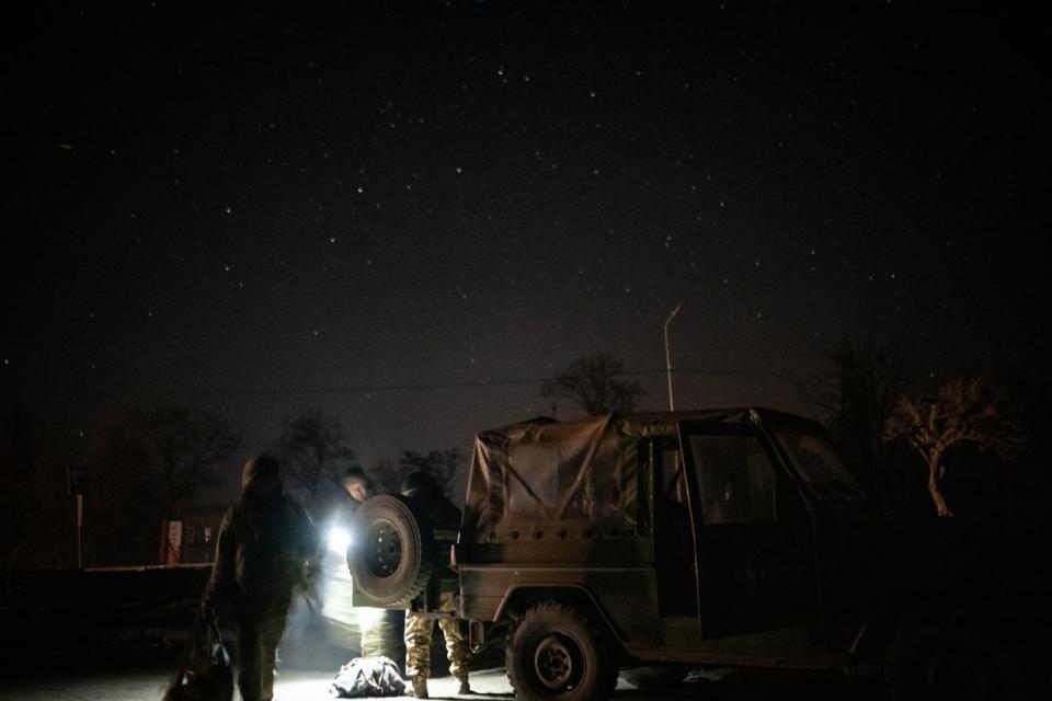 Ukrainian soldiers of the 5th brigade prepare for a 4-day rotation to the frontlines early in the morning as the war between Russia and Ukraine has been going on for the last two years, outside Chasiv Yar, Donetsk Oblast, on March 8, 2024. (Wolfgang Schwan/Anadolu via Getty Images)