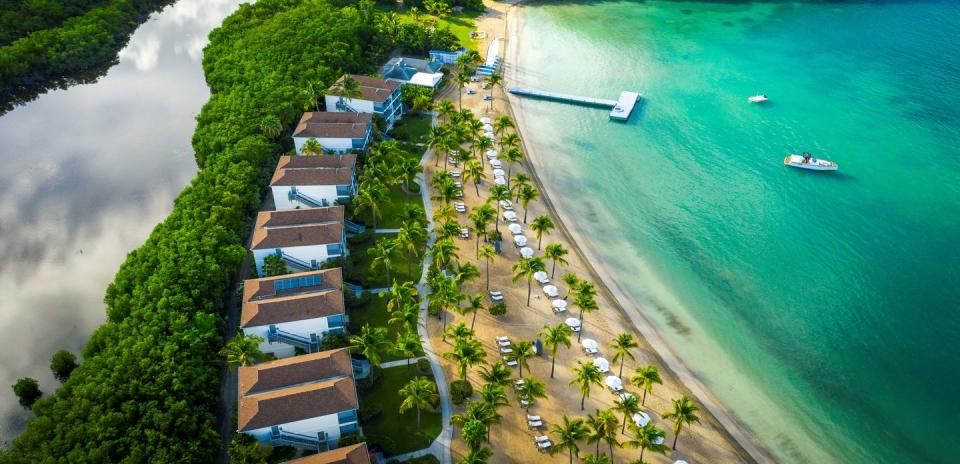 <p>A stunning luxury resort, which was renovated in 2019, <strong><a href="https://www.carlisle-bay.com/" rel="nofollow noopener" target="_blank" data-ylk="slk:Carlisle Bay Antigua;elm:context_link;itc:0;sec:content-canvas" class="link ">Carlisle Bay Antigua</a></strong> is surrounded by a rainforest and leans into wellness programming. But while you're at the open-air yoga pavilion or playing a round of tennis, your kids could be having a blast at the supervised club broken into two age ranges: 4 to 7 and 8 to 12. Activities change daily, but kids may go on beach scavenger hunts, make sandy rainbow crafts and even have a teddy bear picnic. All accommodations are suites — the Beach Terrace Suites, which are just steps from the sand and have two bedrooms, are best for families. The restaurants use locally grown produce, including fruits and veggies from the on-site garden, but offer menus to please the whole family.</p><p><a class="link " href="https://go.redirectingat.com?id=74968X1596630&url=https%3A%2F%2Fwww.tripadvisor.com%2FHotel_Review-g1184718-d287666-Reviews-Carlisle_Bay_Antigua-Saint_Mary_s_Antigua_Antigua_and_Barbuda.html&sref=https%3A%2F%2Fwww.goodhousekeeping.com%2Flife%2Ftravel%2Fg26148438%2Fbest-all-inclusive-family-resorts%2F" rel="nofollow noopener" target="_blank" data-ylk="slk:Shop Now;elm:context_link;itc:0;sec:content-canvas">Shop Now</a> </p>