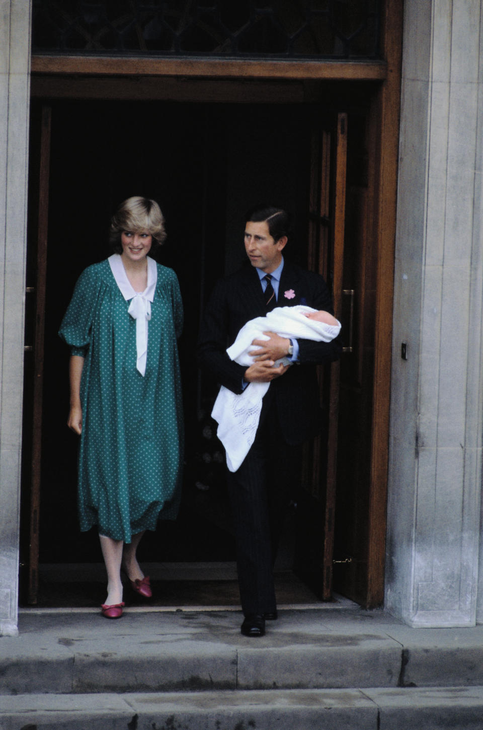 It's interesting to note that when Prince Charles and Princess Diana presented their first child to the world on June 22, 1982, the father held Prince William in his arms. This more modern approach is a tactic later adopted by Prince Harry. [Photo: Getty]
