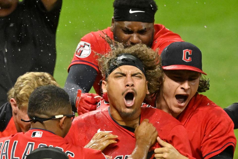 Guardians first baseman Josh Naylor (center) celebrates his game-winning, two-run home run in the 10th inning against the Minnesota Twins, June 29, 2022, in Cleveland