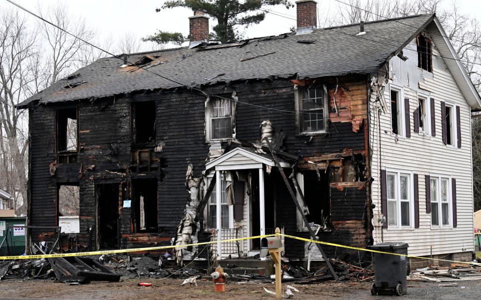 The blaze ripped through the home where two families lived