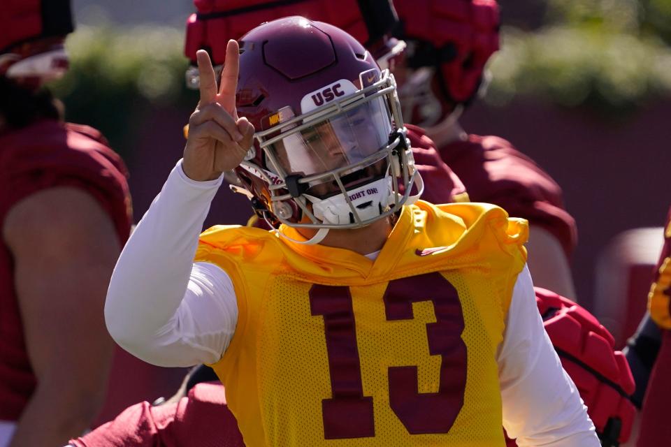 Southern California quarterback Caleb Williams gestures to teammates during a spring practice on March 24.